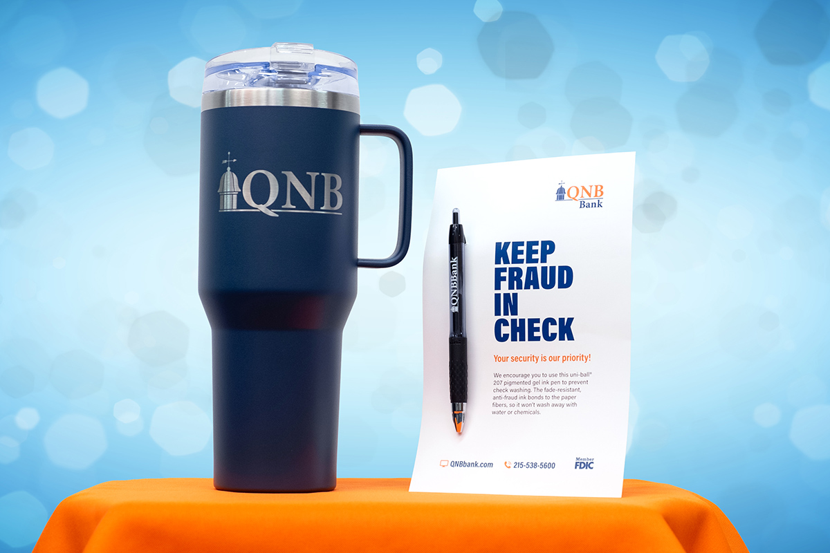 QNB Bank tumbler mug and gel pen